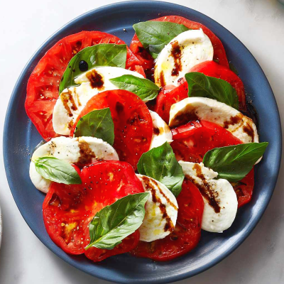 Classic Italian salad with Bosnian twist served at Kašika Viljuška Nož in Sarajevo